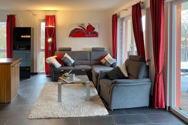 NordseeResort Friesland - Tolles Ferienapartment an der Nordsee mit Südbalkon, Sauna und Whirlbadewanne