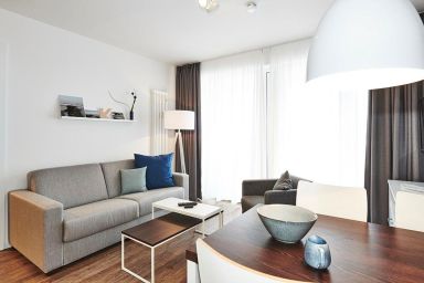 Deichhäuser Anna Küste - Apartment mit zwei Balkonen inkl. Schwimmbad- & Saunanutzung in Strandnähe