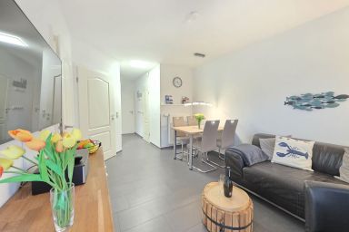 Ferienwohnung KüstenSAND - Komfortable Ferienwohnung KüstenSAND mit Terrasse und Garten in Norddeich