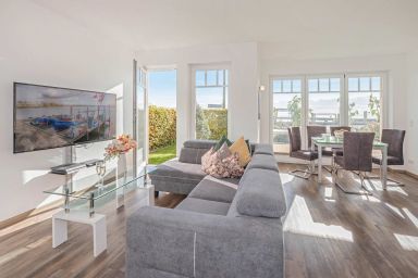 Haffblick - Moderne Ferienwohnung mit Terrasse & Seeblick – nur 350 m zum Haff