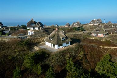Haus Sonnenland - "Traumhaftes Ferienhaus unter Reet mit Meerblick"