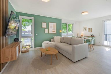 Ferienwohnung Peppi - Moderne Ferienwohnung in Kölpinsee mit Balkon, fußläufig zum Strand & See