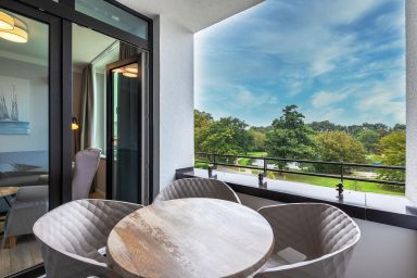 Ferienwohnungen am Godewindpark Travemünde - Komfortables Apartment mit überdachtem Balkon und Wellnessbereich in Travemünde