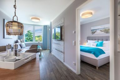Ferienwohnungen am Godewindpark Travemünde - Komfortables Apartment mit überdachtem Balkon und Wellnessbereich in Travemünde