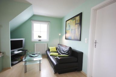 Gemütliche, strandnahe Ferienwohnung mit Garten Gemütliche, strandnahe Ferienwohnung mit Garten