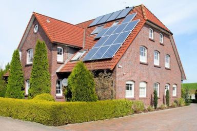 Wohnung in Hohenkirchen mit Terrasse, Garten und Grill
