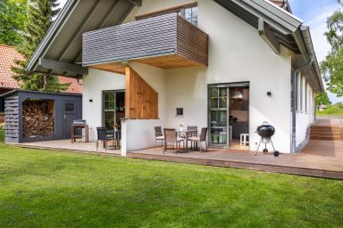 Ferienhaus Sonne, Mond und Sterne bei Kühlungsborn OFC 14 - Ferienwohnung Mond mit Terrasse, Kamin und Garten