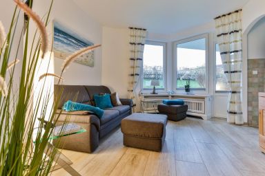 Strandperle - Modernes 2-Zimmer App. mit Terrasse, PKW-Stellplatz, WLAN. Haustiere erlaubt.
