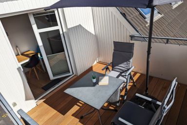Ferienwohnung S40 "Sonnendeck" - Moderne Fewo für zwei Personen in unmittelbarer Strandnähe mit WLAN.