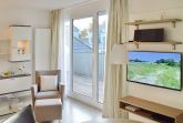 Wohnzimmer mit Fernseher