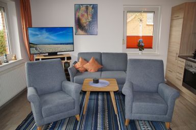 Urlauberdorf - Familienfreundliches, strandnahes Ferienhaus mit Terrasse, Spiel- und Grillplatz