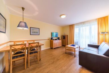 Hus Inselkieker - Strandnahe 3-Zimmer Ferienwohnung mit Balkon und direkt am Nordseedeich gelegen