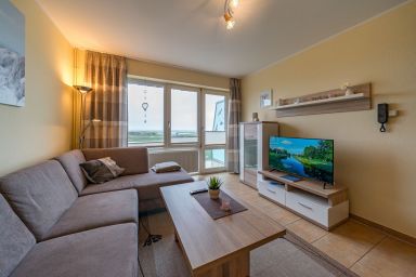 Hus Strandkieker - Gemütliches Maisonette-Ferienapartment mit Meerblick und Balkon an der Nordsee