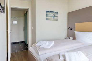 Resort Deichgraf - Tolle, ruhige Ferienwohnung in Strandnähe mit Sauna, Meerblick und zwei Balkonen