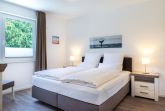 Schlafzimmer "1" mit Boxspringbett (1,80x2,00m)