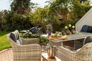 TECHTs  Apartmenthaus - Apartment „Seestern“ – Stilvoller Rückzugsort mit Terrasse und wunderschönem Garten