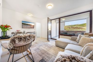 Haus Delphin - Frisch renovierte Ferienwohnung in direkter Strandlage mit Westbalkon