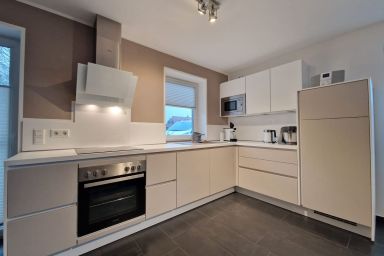 Ferienhaus Hilgenhuus - Ferienhaus Hilgenhuus in Hilgenriedersiel mit Sauna, Garten und Terrasse