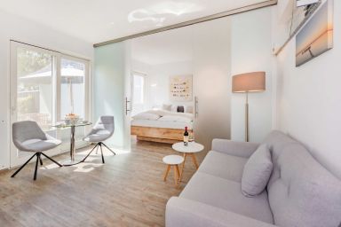 Kuschelnest - Gemütliche Ferienwohnung mit Terrasse & Haffblick – ruhige Lage am See