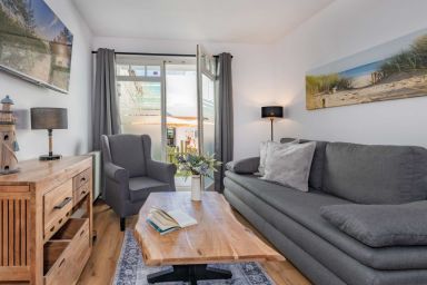 Regina Maris Ostseestern - Gemütliche Ferienwohnung mit Terrasse und Meerblick – nur 150 m zum Strand