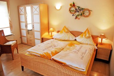 Appartementhaus zur Brücke direkt am See - Ferienappartement Sonnenblume mit Seeblick und Terrasse