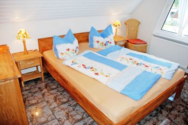 Ferienwohnungen im Haus am Deich - Ferienwohnung Mönchgut mit Seeblick