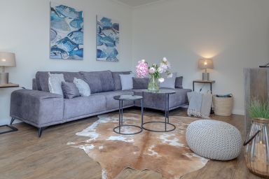 Königsmann - Strandnah und zentral gelegene, moderne Ferienwohnung mit Südbalkon.