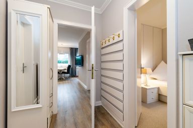 Austernperle - 3-Zimmer-Ferienwohnung im EG für max. 3 Personen mit Terrasse & Strandkorb.