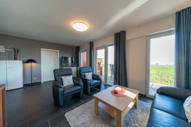 NordseeResort Friesland - Exklusives Ferienapartment mit Meerblick, Balkon, Sauna und Whirlbadewanne