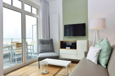 Aparthotel Anna Düne - Modernes Apartment an der See mit Westbalkon, Meerblick und eigenem Strandkorb!