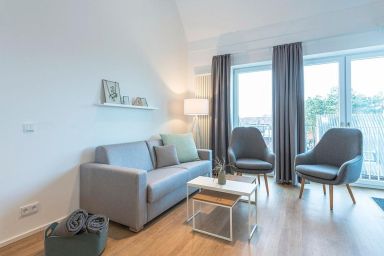 Apartmentvilla Anna See - Apartment in Strandnähe mit sonniger Süd-West-Loggia, Badewanne & Sauna im Haus!