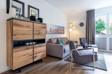 Aparthotel Ostseeallee - Tolles Ferienapartment nahe der Ostsee mit Terrasse, Spielplatz und Saunabereich