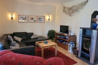 Ferienwohnung SCHNEIDER - Gehobene ebenerdige Ferienwohnung direkt am Deich in Fedderwardersiel