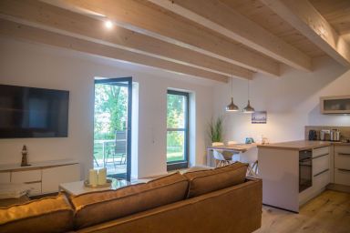 Gulfhof Wangermeer - Wilma – Ferienwohnung im Gulfhof Wangermeer mit Sauna und Terrasse