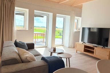 Gulfhof Funnixerhörn - dree – Ferienwohnung bei Carolinensiel für Paare, 66 m², Sonnenterrasse