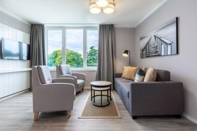 Ferienwohnungen am Godewindpark Travemünde - Strandnahes Apartment mit Wellnessbereich und überdachtem Balkon für bis 6 Gäste