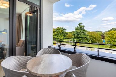 Ferienwohnungen am Godewindpark Travemünde - Stilvolles Apartment mit sonnigem Balkon und exklusivem SPA-Bereich