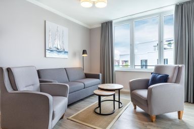 Ferienwohnungen am Godewindpark Travemünde - Hochwertiges Apartment in Ostseenähe mit sonniger Loggia und Saisonstrandkorb