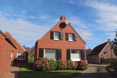 Kiek In - Gemütliches Ferienhaus Kiek In mit Kamin, Garten und Terrasse bei Greetsiel