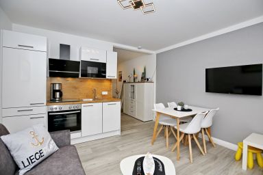 Zaunkönig - Zaunkönig 07, 2-Zimmer-Ferienwohnung im Erdgeschoss mit Terrasse und Parkplatz