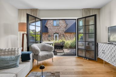 Sylter Kompass - Strandnahes Wohnen für 4 Personen im Neubau mit Terrasse und eigener Sauna