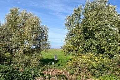 Ferienwohnungen Alter Bahnhof mit Terrasse und Garten OFC 06 - Nr. 3 mit Meerblick vom Balkon und Kamin