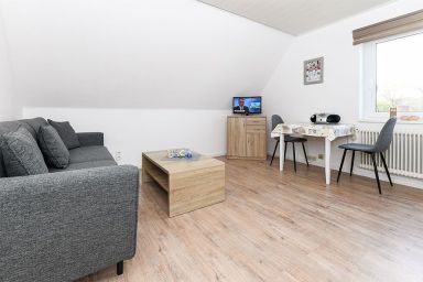 Ferienwohnungen im Haus Waterkant in Neuharlingersiel - Ferienwohnung Strandflieder