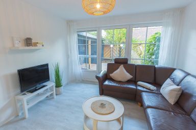 Ferienhaus Lüttjes Strandhus, FeWo Vermittlung Nordsee - Ferienhaus Lüttjes Strandhus