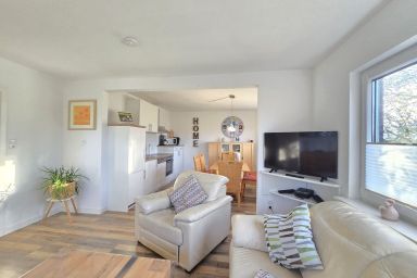 Ferienhaus Hus Achtern Diek Neßmersiel - Herzlich Willkommen in der Ferienwohnung Hus Achtern Diek!