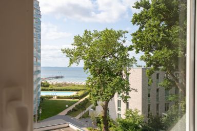 Gästehaus Windrose - Gemütliche Dachgeschoss-Wohnung mit kleinem Balkon und Meerblick in Pelzerhaken