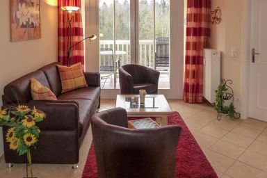Dünenschloss - Ostsee-Ferienwohnung mit Südbalkon und Waldblick, Saunabereich & Pool im Haus!