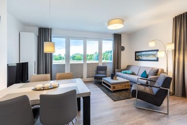 Aparthotel Ostseeallee - Tolles, strandnahes Ferienapartment mit schönem Balkon und Blick über die Felder