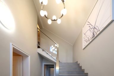 Strandvilla - Großzügige Ferienwohnung in zentraler Lage mit Garten und überdachter Terrasse.