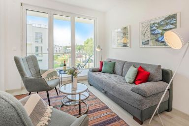 Ferienwohnung Haffblick 1 - Moderne Ferienwohnung mit Balkon, Sauna und Gartenblick am Stettiner Haff